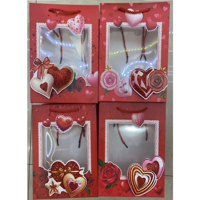 BOLSA DE REGALO 31X40 CM CORAZONES VISOR PACK X12