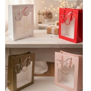 BOLSA DE REGALO 26X32 CM MOÑO CON VISOR