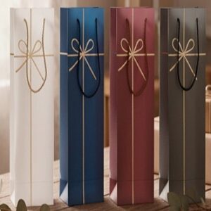 BOLSA VINO 12,7 X 36 CM STAMPING MOÑO LAZO